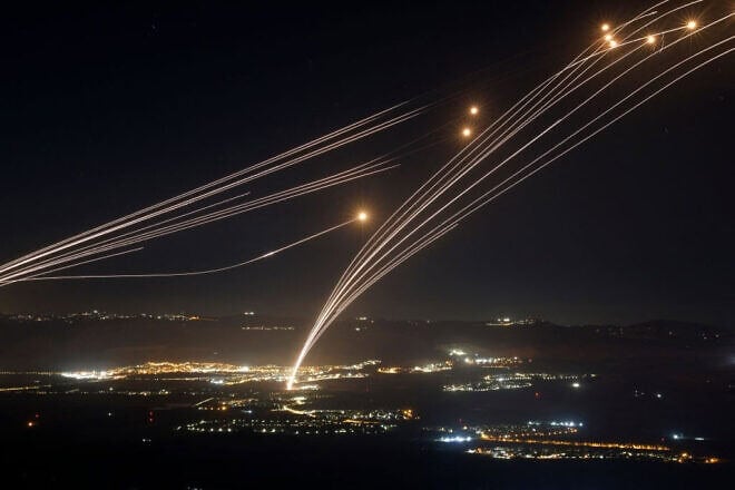Rockets fired from Southern Lebanon are intercepted by Israel's Iron Dome air defense system over the Upper Galilee region in northern Israel, on Aug. 4, 2024. Photo by Jalaa Marey/AFP via Getty Images.