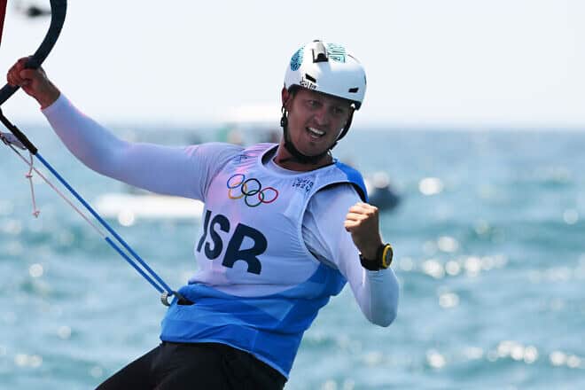 Tom Reuveny of Team Israel reacts after competing in the Men's Windsurf iQFoil class semi-final on day eight of the Paris Summer Olympic Games, Aug. 3, 2024. Photo by Clive Mason/Getty Images.