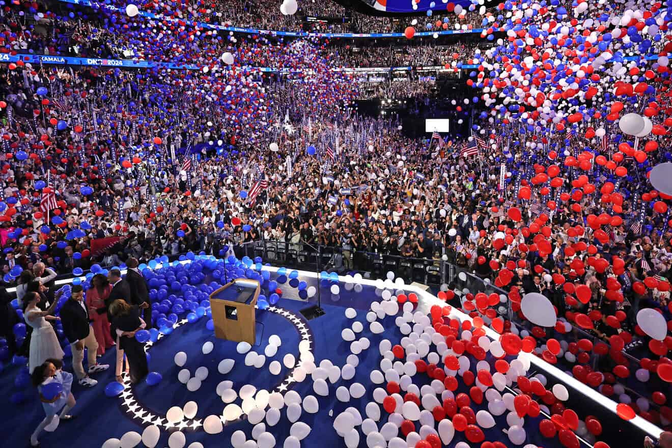 Balloons fall after U.S. Vice President and Democratic presidential candidate Kamala Harris concluded her remarks on the fourth and last day of the Democratic National Convention at the United Center in Chicago, Illinois, on Aug. 22, 2024. Photo by Mike Segar/POOL/AFP via Getty Images.