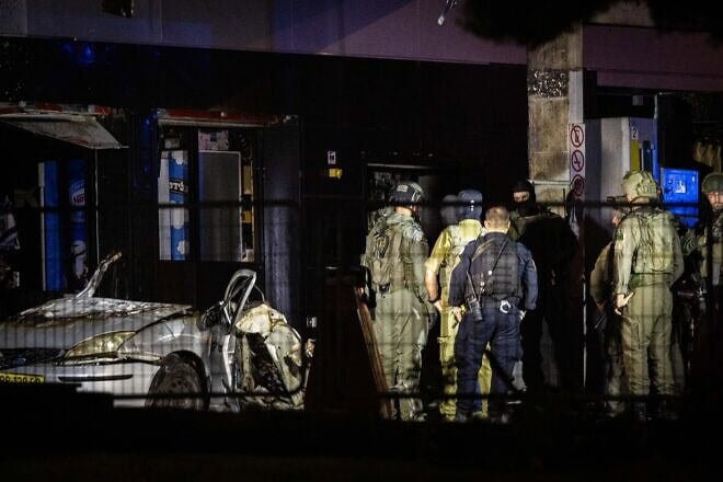 Security forces at the scene of a car bomb explosion at the Gush Etzion Junction in Judea, Aug. 31, 2024. Photo by Yonatan Sindel/Flash90.