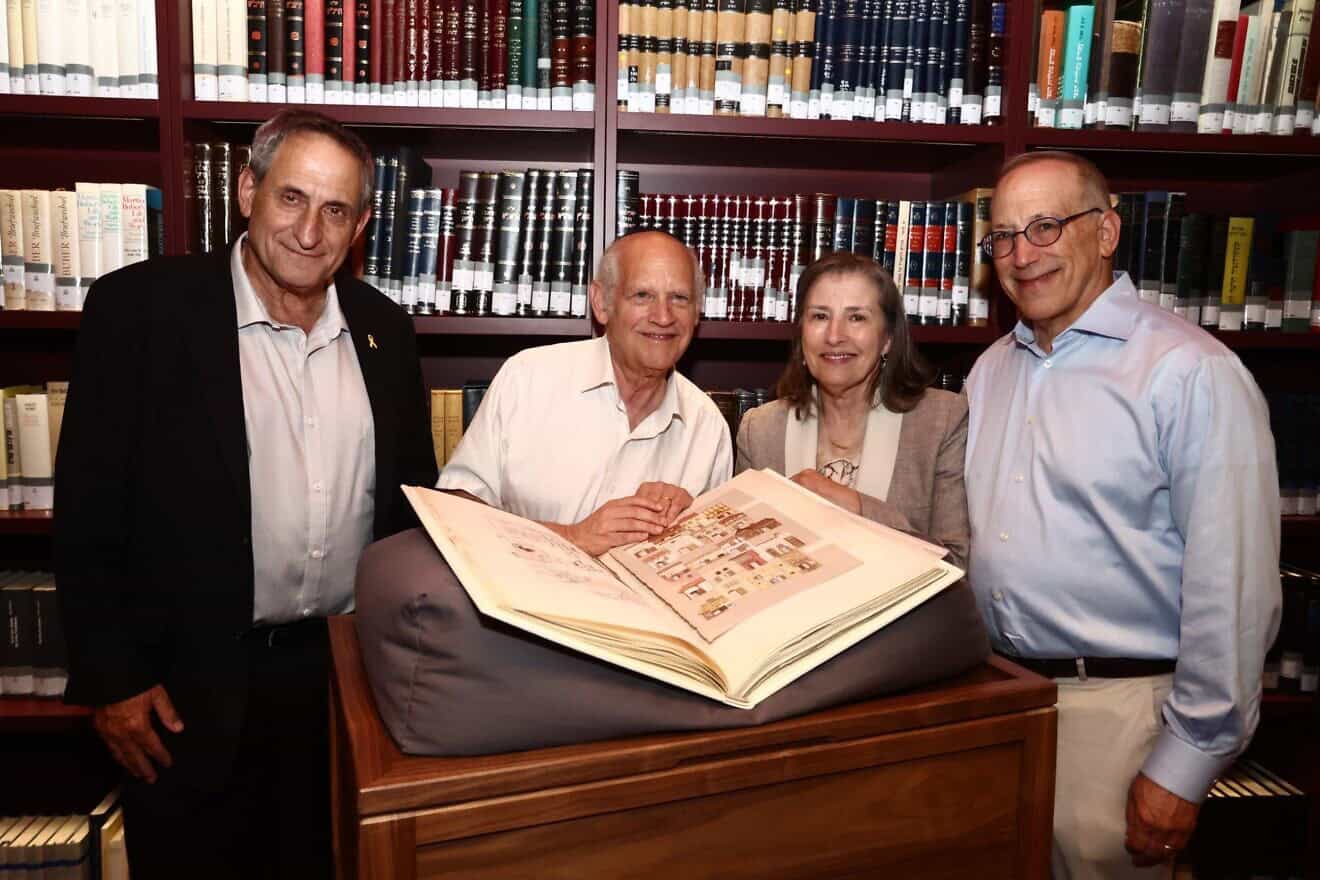 The Moss Haggadah is presented to the National Library of Israel in Jerusalem at a ceremony that included (from left) National Library of Israel chairman Sallai Meridor; artist David Moss; and donors Trudy Elbaum Gottesman and Bob Gottesman, Aug. 6, 2024. Photo by Dor Pazuelo.