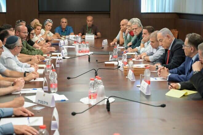 Israeli Prime Minister Benjamin Netanyahu meets with families of hostages and fallen IDF soldiers at the Prime Minister's Office in Jerusalem, Aug. 20, 2024. Credit: Ma'ayan Toaf/GPO.
