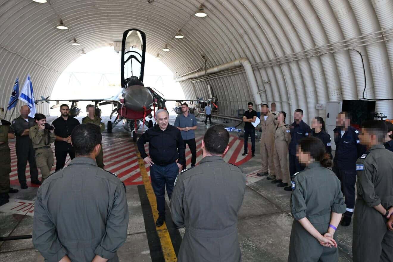 Israeli Prime Minister Benjamin Netanyahu speaks with IAF airmen and airwomen during a visit to Ramat David Airbase in northern Israel on Aug. 21, 2024. Photo by Haim Zach (GPO).