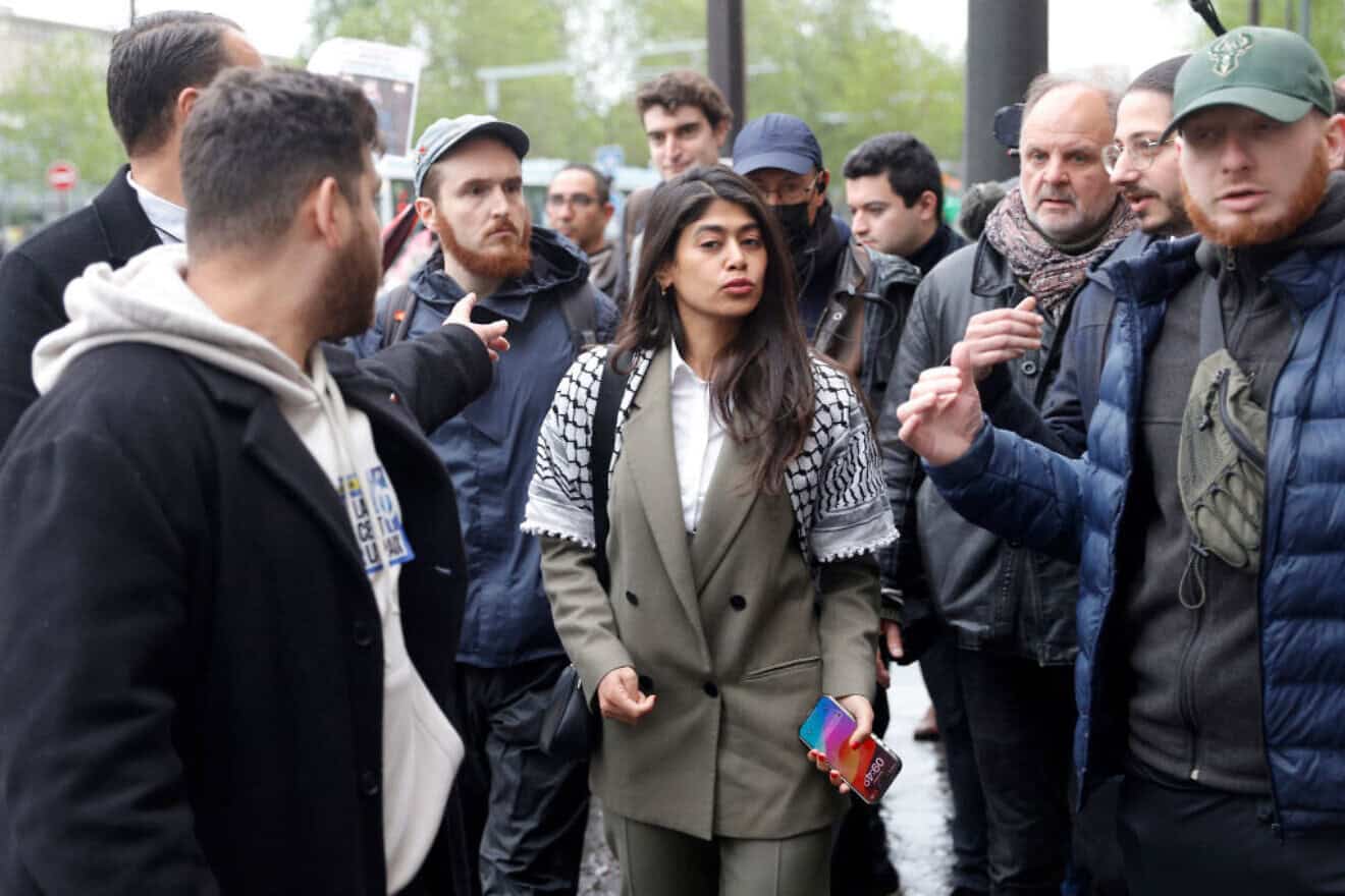 La France Insoumise European Parliament candidate Rima Hassan leaves a rally in Paris on April 30, 2024. Photo by Geoffroy Van der Hasselt/AFP via Getty Images.