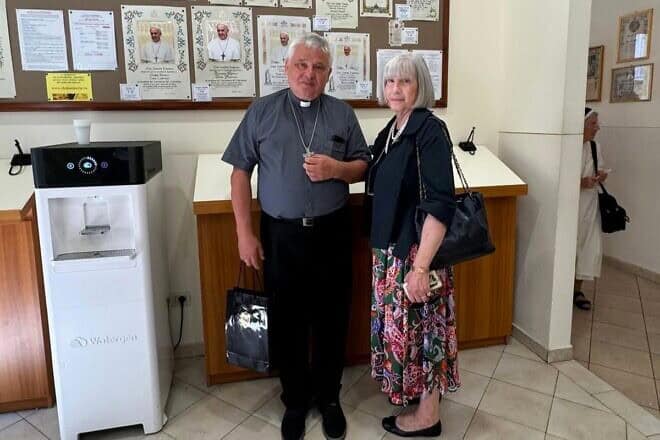 Cardinal Konrad Krajewski and members of his team at the Office of Papal Charities at the Vatican in Rome organized the installation of a Watergen system to provide clean drinking water extracted from the air, August 2024. Credit: Watergen.