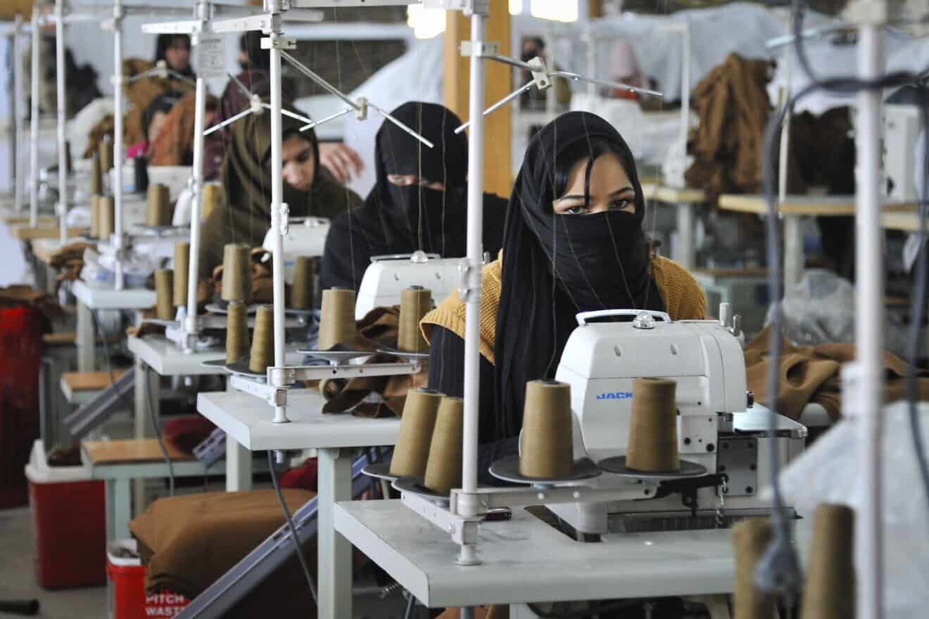 Afghan women work at a textile factory in Kabul in January 2012. Credit: Senior Airman Andrea Salazar/U.S. Armed Forces.