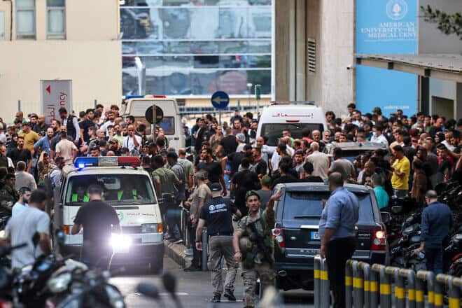 Ambulances are surrounded by people at the entrance to the American University of Beirut Medical Center after explosions hit locations in several Hezbollah strongholds around Lebanon on Sept. 17, 2024. Photo by Anwar Amro/AFP via Getty Images.