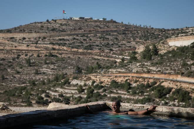 Israelis enjoy a warm summer day near the community of Ateret in Samaria, July 11, 2018. Photo by Hadas Parush/Flash90.