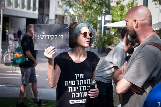 Activists protest against gender segregation during a public prayer on Dizengoff Square in Tel Aviv on Oct. 5, 2023. Photo by Avshalom Sassoni/Flash90.