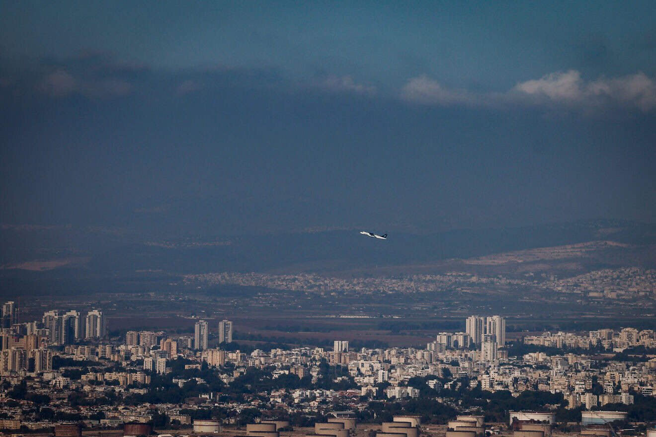A plane takes off from Haifa Airport, Aug. 1, 2024. Photo by Chaim Goldberg/Flash90.