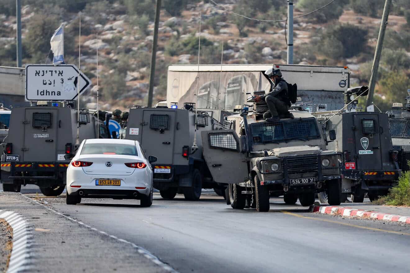 Israeli security forces stand guard at the scene of a shooting attack, near Tarqumiyah, in Judea, Sept. 1, 2024. Photo by Wisam Hashlamoun/Flash90.