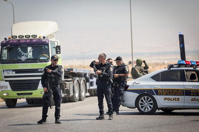 Police at the Allenby Bridge crossing to Jordan after three Israelis were killed by a terrorist on Sept. 8, 2024. Photo by Yonatan Sindel/Flash90.