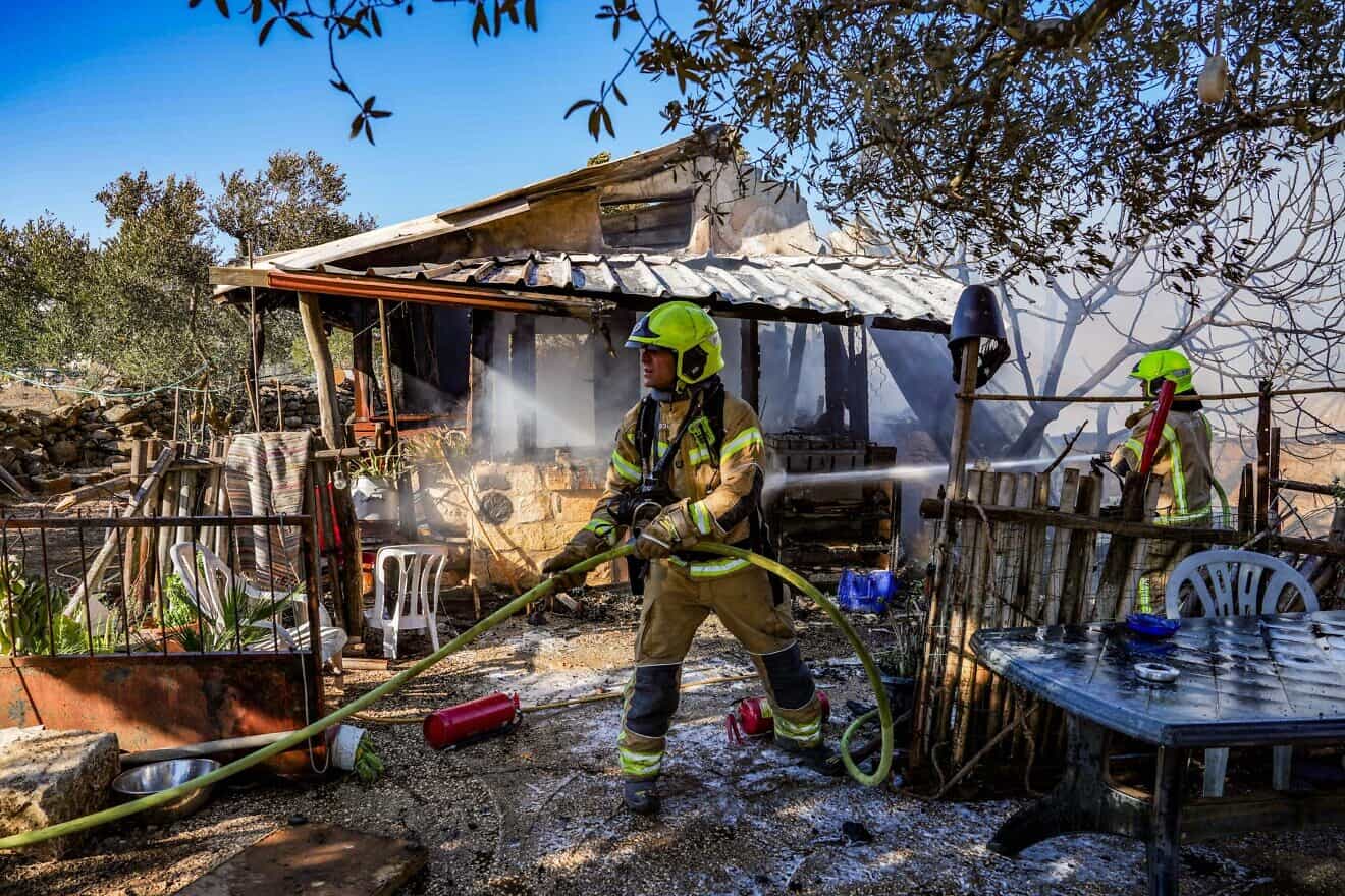 Israeli firefighters at a house in Kadita, near Safed, that was hit by a missile from Lebanon, Sept. 21, 2024. Photo by Ayal Margolin/Flash90.