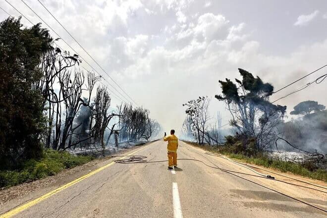 Israel's Fire and Rescue Services works to keep blazes at bay in northern Israel as a result of rocket attacks by Hezbollah in Lebanon, September 2024. Credit: Courtesy of KKL-JNF.