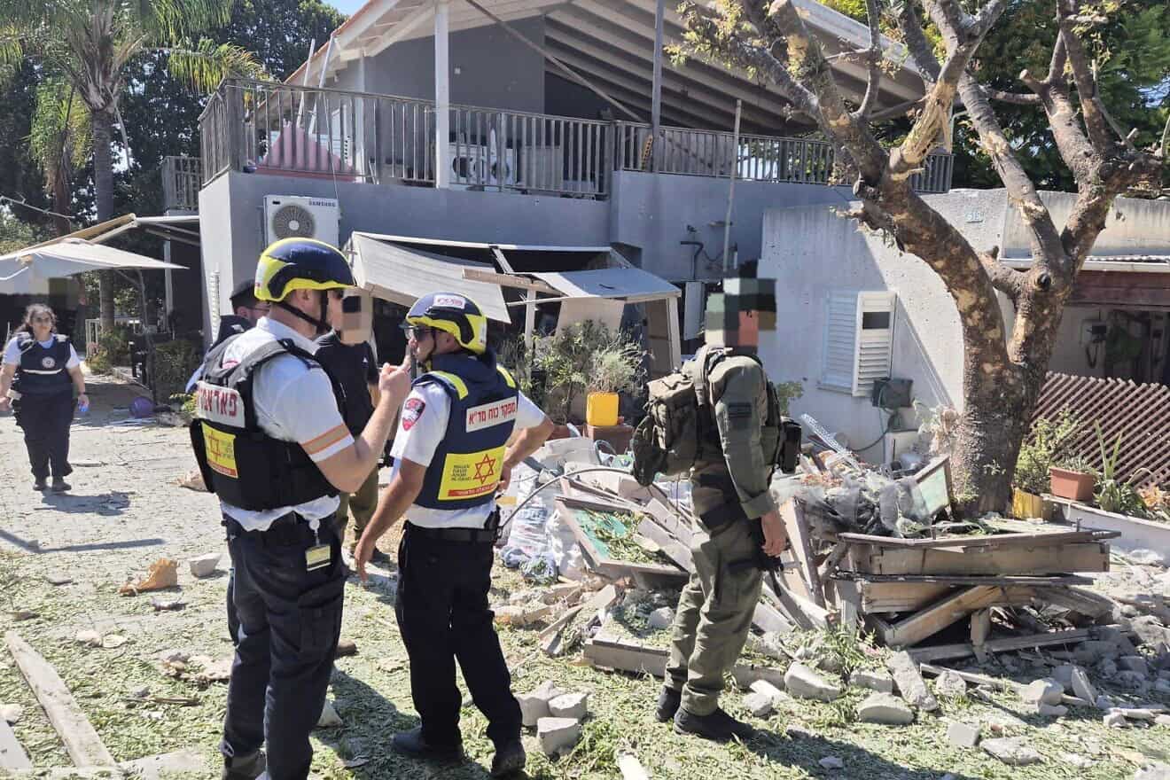 Emergency medical personnel and soldiers inspect the scene of a Hezbollah rocket strike in Kibbutz Sa'ar in northern Israel on Sept. 25, 2024. Credit: MDA.