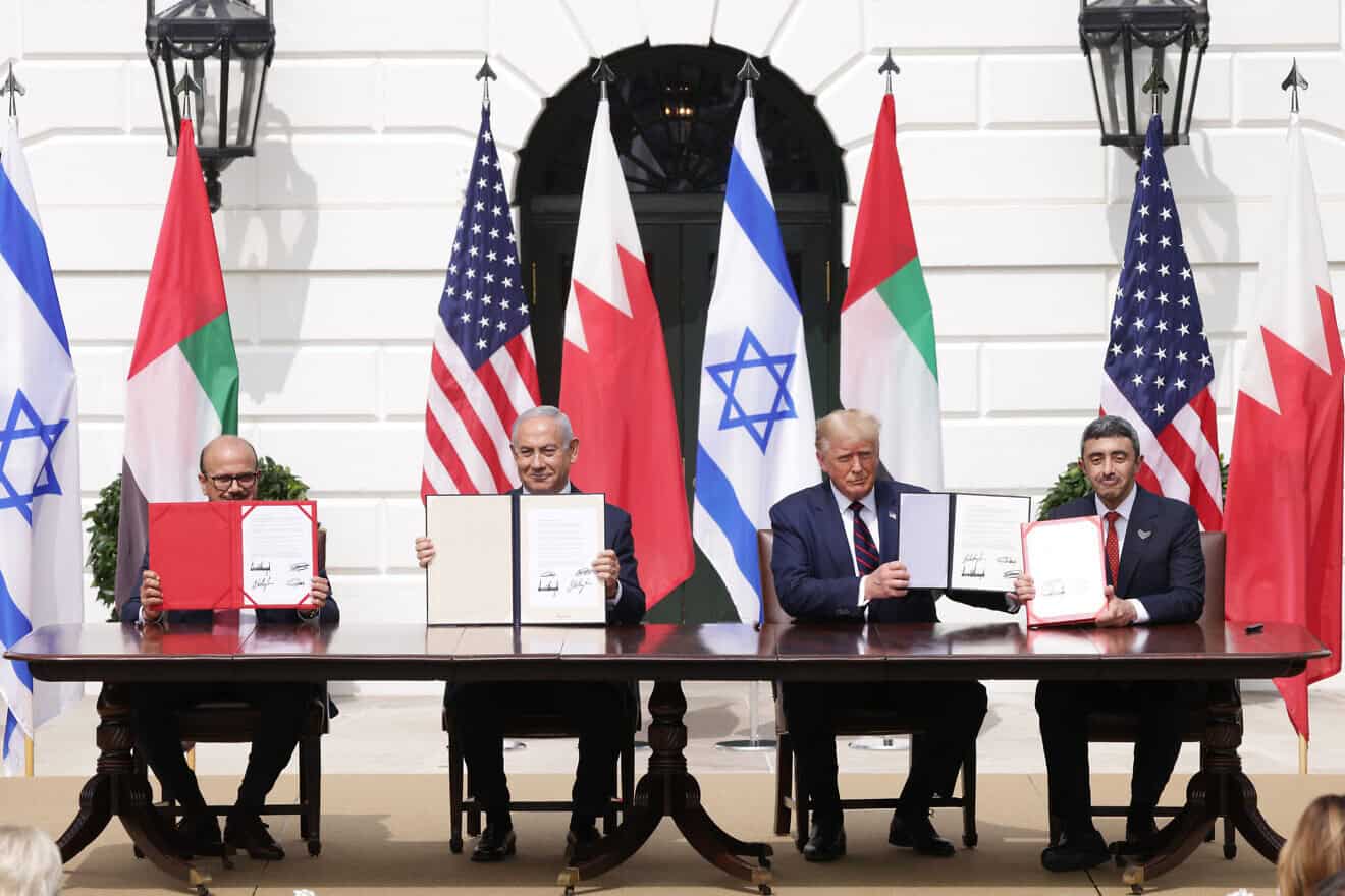 Bahraini Foreign Minister Abdullatif bin Rashid Al Zayani, Israeli Prime Minister Benjamin Netanyahu, U.S. President Donald Trump and United Arab Emirates Foreign Minister Sheikh Abdullah bin Zayed Al Nahyan participate in the signing ceremony of the Abraham Accords on the South Lawn of the White House, Sept. 15, 2020. Photo by Alex Wong/Getty Images.