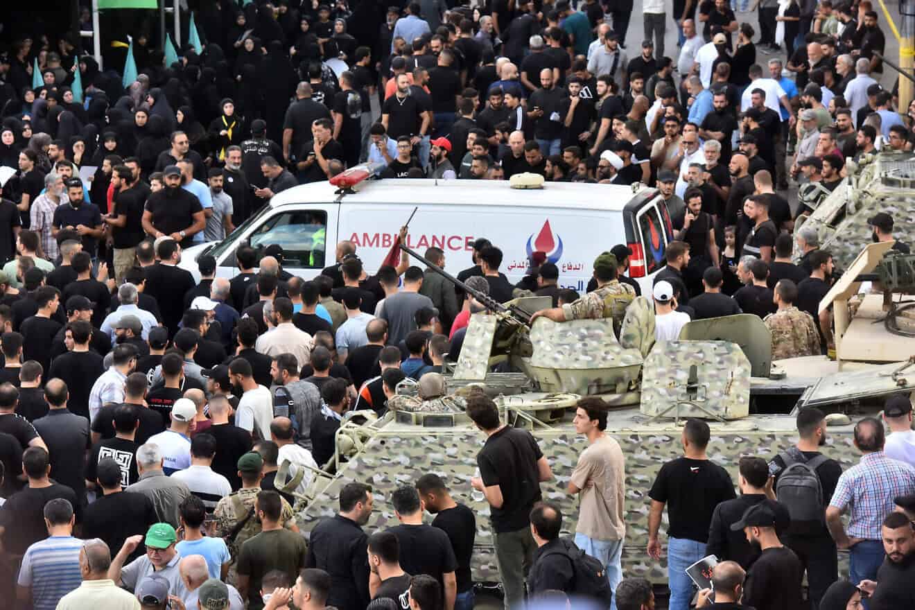 Lebanese soldiers stand guard as an ambulance arrives, after a Hezbollah communication device exploded during a funeral for the casualties of a wave of such blasts the previous day targeting the terrorist group, in Beirut's southern suburbs on Sept. 18, 2024. Photo by Fadel Itani/AFP via Getty Images.