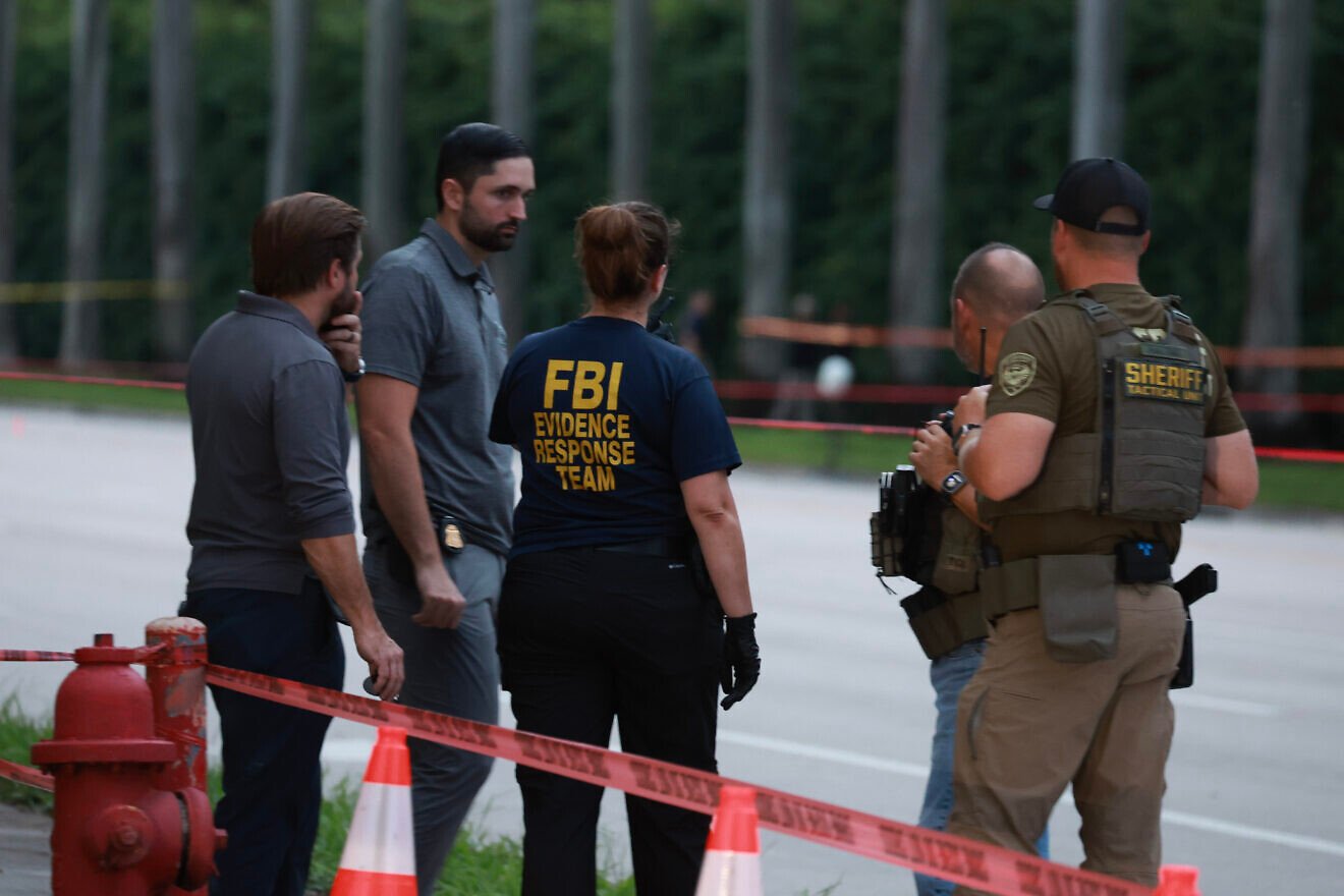 Law enforcement personnel investigate the area around Trump International Golf Club after an apparent assassination attempt of former President Donald Trump on Sept. 15, 2024 in West Palm Beach, Fla. Photo by Joe Raedle/Getty Images.