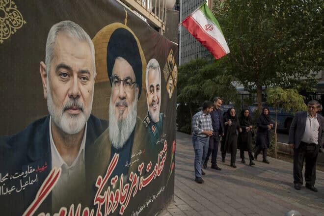 A banner bearing a picture of slain Hezbollah leader Hassan Nasrallah in central Tehran on Sept. 29, 2024. Photo by Majid Saeedi/Getty Images.