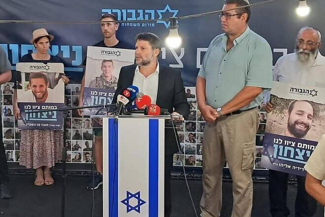 Israeli Finance Minister Bezalel Smotrich visits the Gvura Forum protest tent near the Prime Minister's Residence in Jerusalem, Sept. 1, 2024. Credit: Gvura Forum/Facebook.