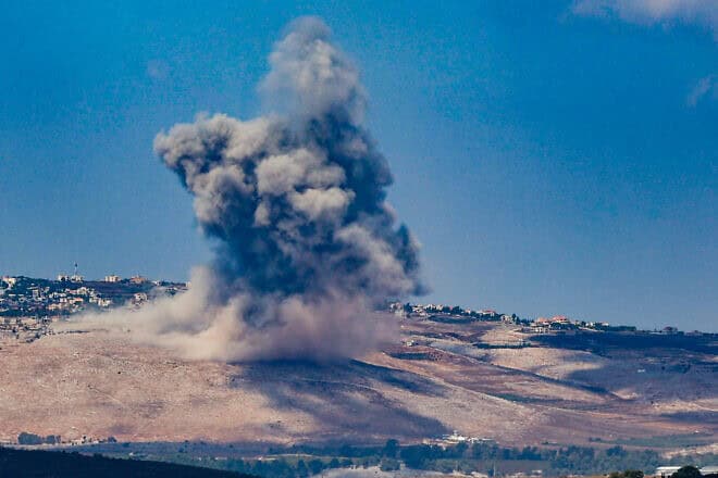 Smoke rises after an Israeli airstrike in Southern Lebanon, as seen from the Israeli side of the border, Sept. 23, 2024. Photo by David Cohen/Flash90.