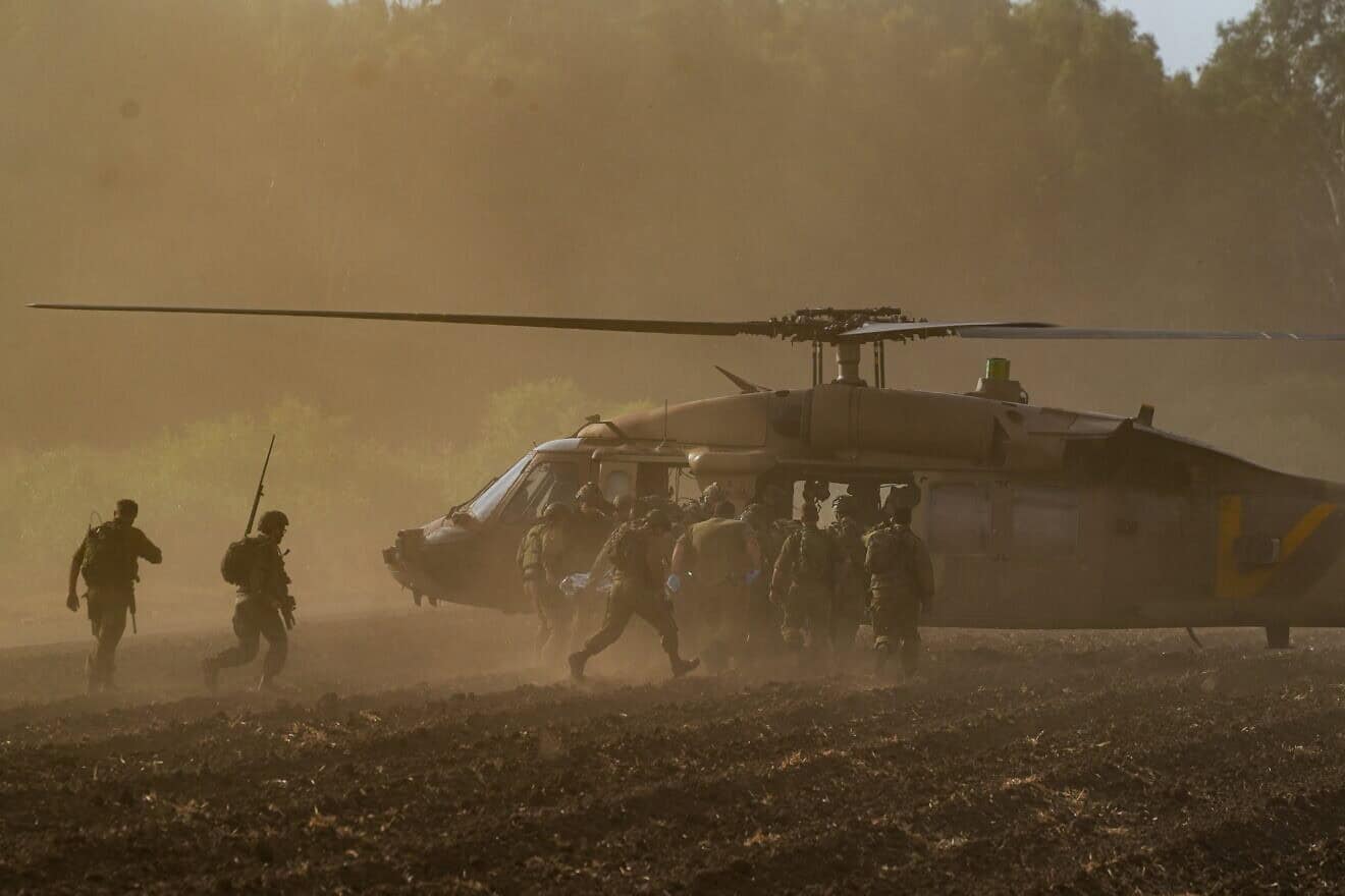 Israeli soldiers evacuate people who was severely wounded when a Lebanese missile hit the Ramim Cliff area near the border on Sept. 19, 2024. Photo by Ayal Margolin/Flash90.