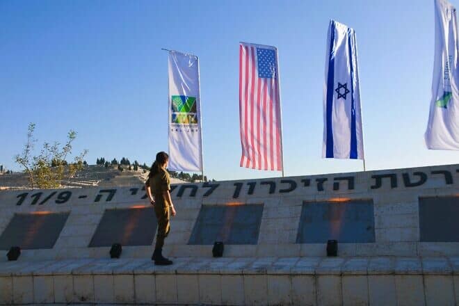 IDF St. Sgt. Jamie Gartenberg Pila finds her father's name on the Jerusalem Living Memorial on Sept. 11, 2024. Photo by Sharon Altshul.