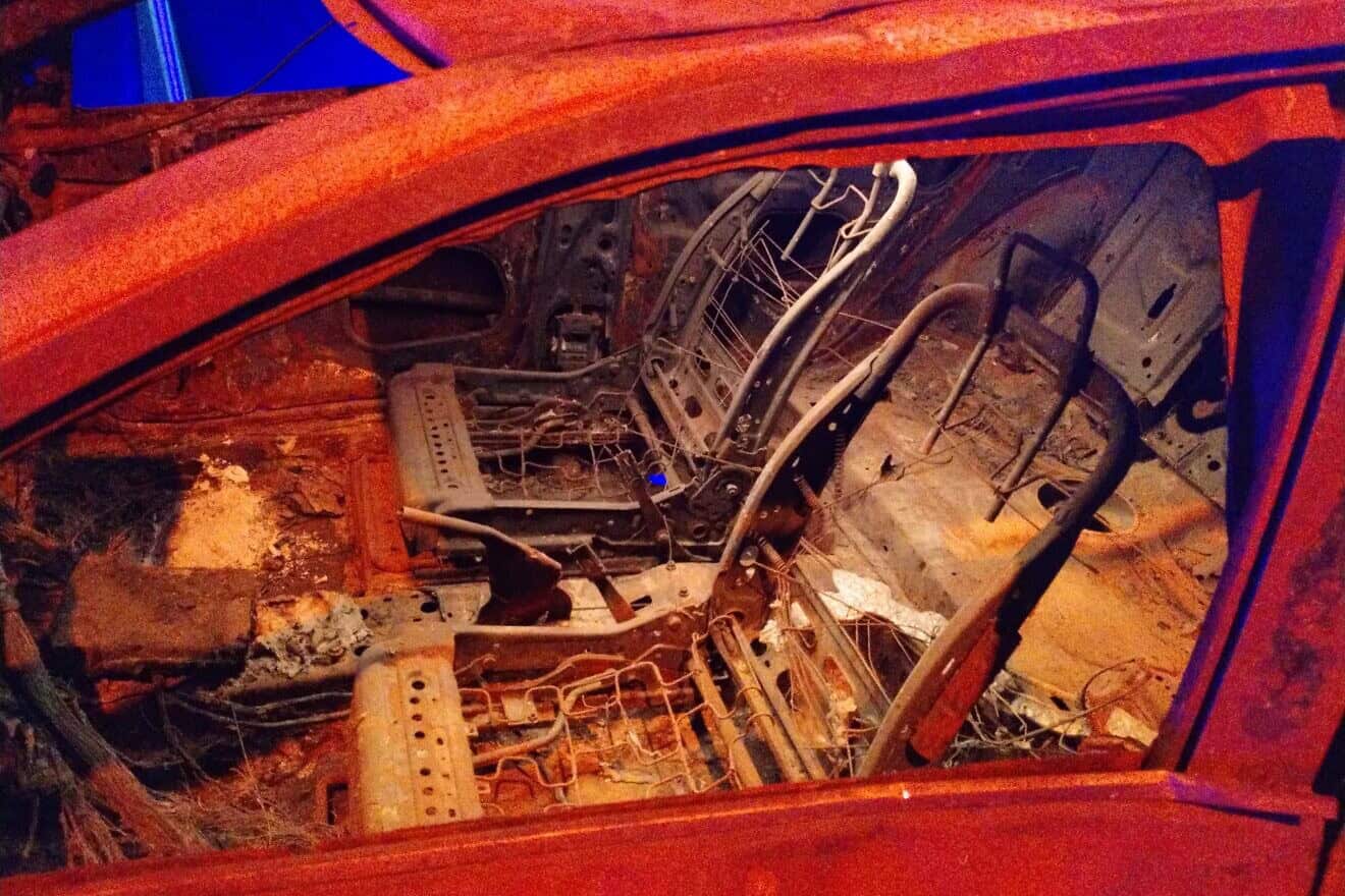 A car burned by Hamas terrorists during the assault in southern Israel on Oct. 7, 2023, part of a traveling Nova Music Festival exhibit that was shown in New York City, June 2024. Photo by Carin M. Smilk.