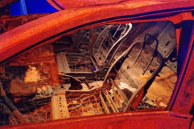 A car burned by Hamas terrorists during the assault in southern Israel on Oct. 7, 2023, part of a traveling Nova Music Festival exhibit that was shown in New York City, June 2024. Photo by Carin M. Smilk.