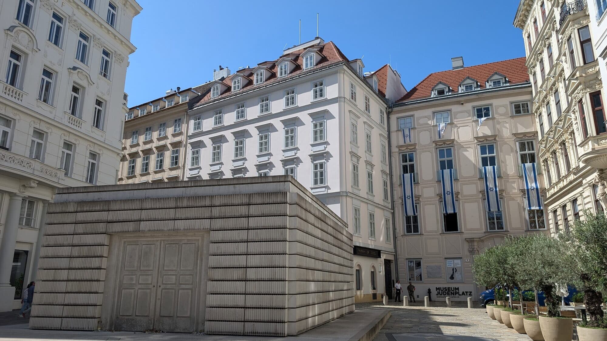 Judenplatz, the town square in Vienna's Innere Stadt that was the center of Jewish life in the Middle Ages. The Memorial to the Austrian Jewish Victims of the Shoah is seen in the foreground and the Museum Judenplatz in the background, Vienna, Austria, Aug. 25, 2024. Photo by Michal Eliasy Marks.