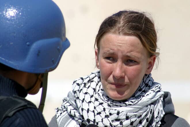 International Solidarity Movement activist Rachel Corrie speaks during an interview with "MBC Saudi Arabia" TV in Rafah, in the southernmost part of the Gaza Strip, on March 14, 2003. Photo by Lorenzo Scaraggi/Getty Images.