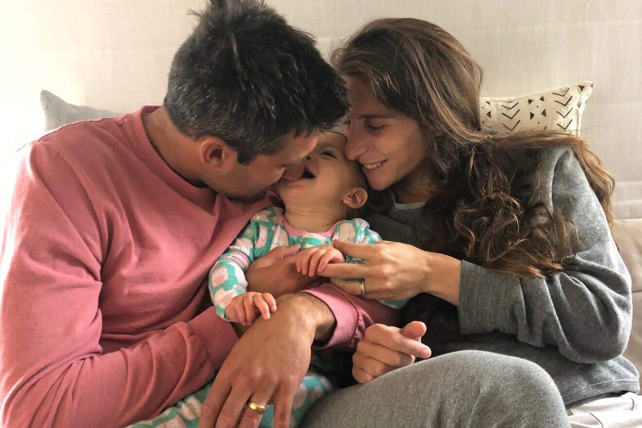 Dr. Matt Goldstein and his wife, Myra Sack, with their daughter Havi. Credit: Courtesy of JScreen.