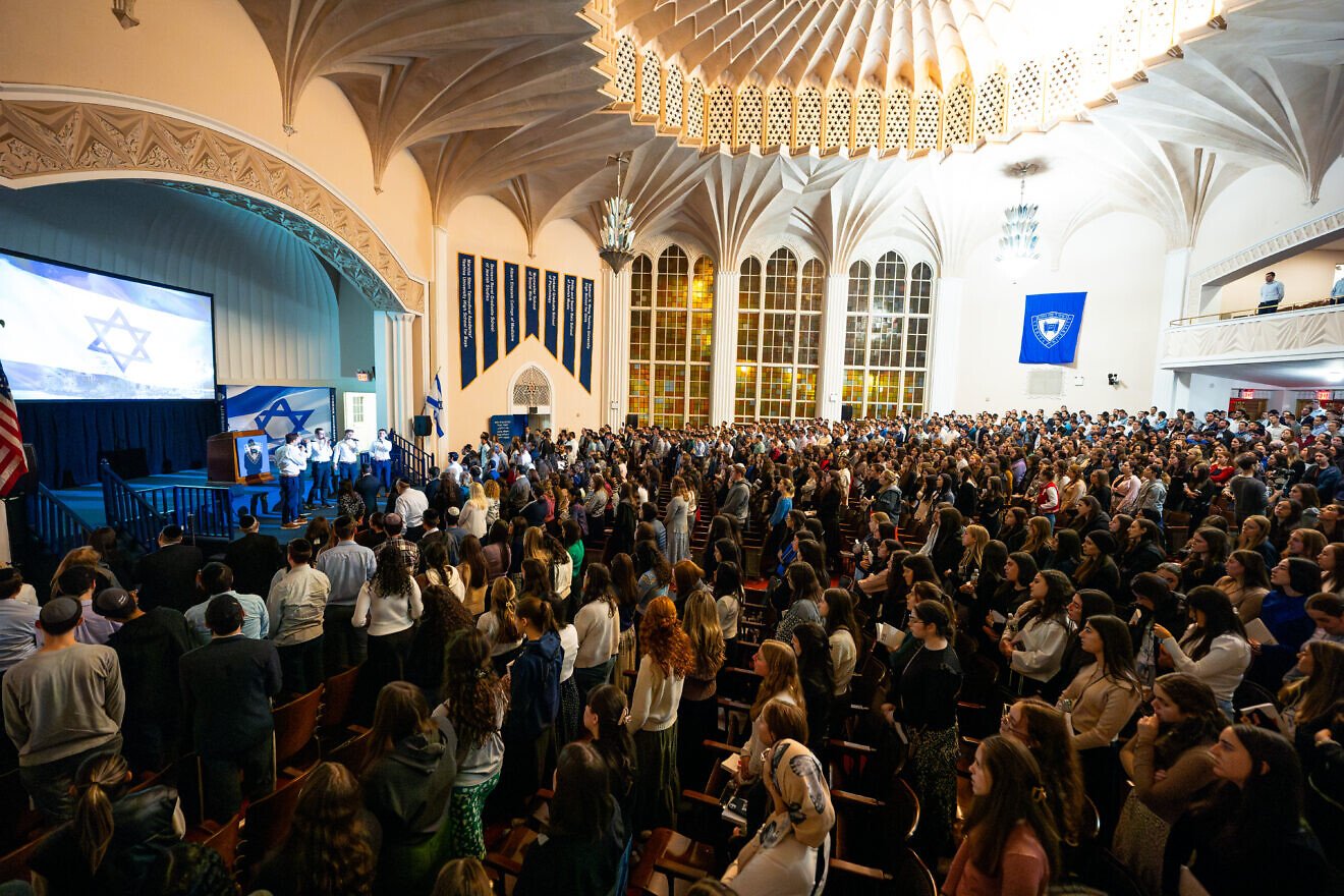 Attendees sing “Hativkah” at a memorial marking the anniversary of the the Oct. 7 terrorists attack in Israel, held at Yeshiva University's Washington Heights campus in New York City on Sept. 30, 2024. Credit: Yeshiva University.