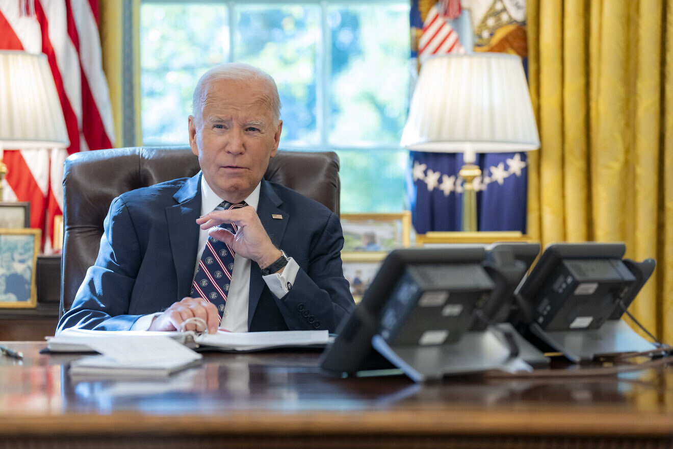 U.S. President Joe Biden participates in a phone call with a head of state on Oct. 7, 2024, in the Oval Office. Photo by Adam Schultz/White House.