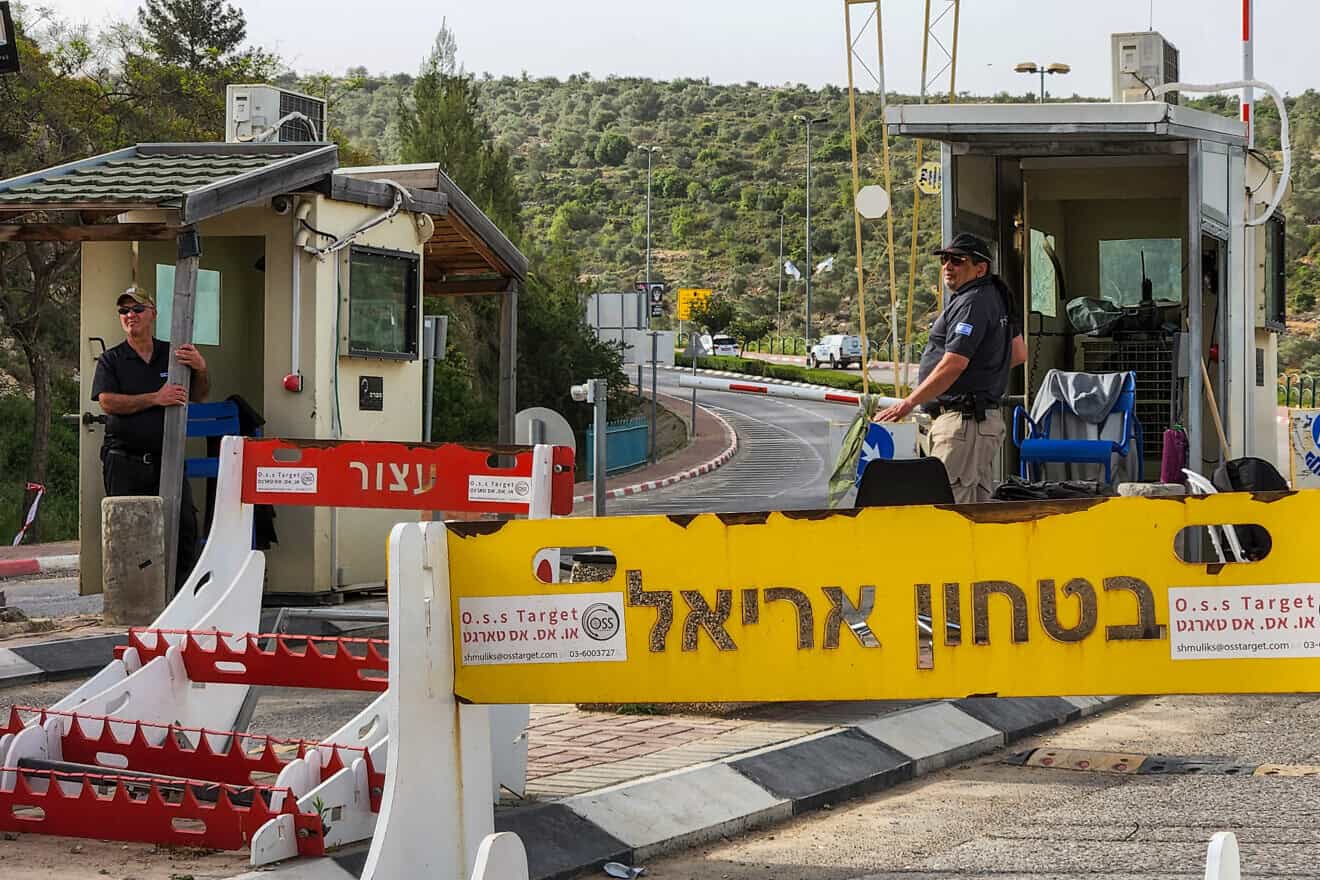 Security guards at the entrance to the city of Ariel in Samaria, April 30, 2022. Credit: Flash90.