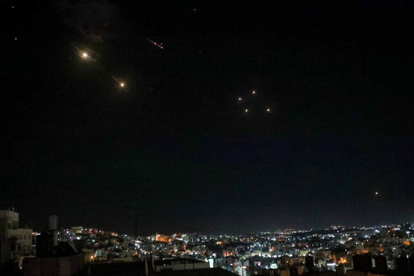 An Israeli defense system fires interceptors at missiles launched from Iran, as seen in Judea and Samaria on Oct. 1, 2024. Photo by Wisam Hashlamoun/Flash90.