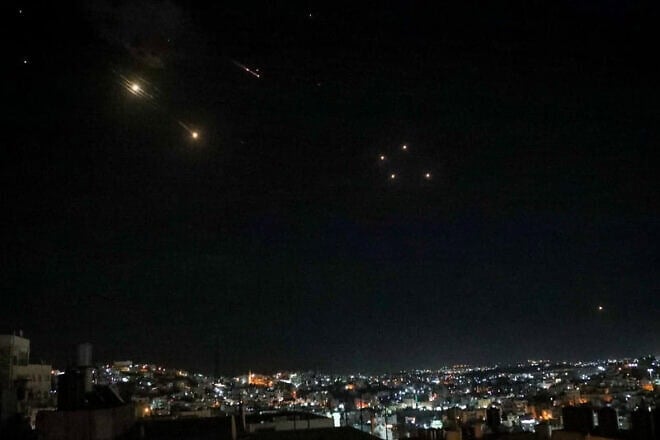 An Israeli defense system fires interceptors at missiles launched from Iran, as seen in Judea and Samaria on Oct. 1, 2024. Photo by Wisam Hashlamoun/Flash90.