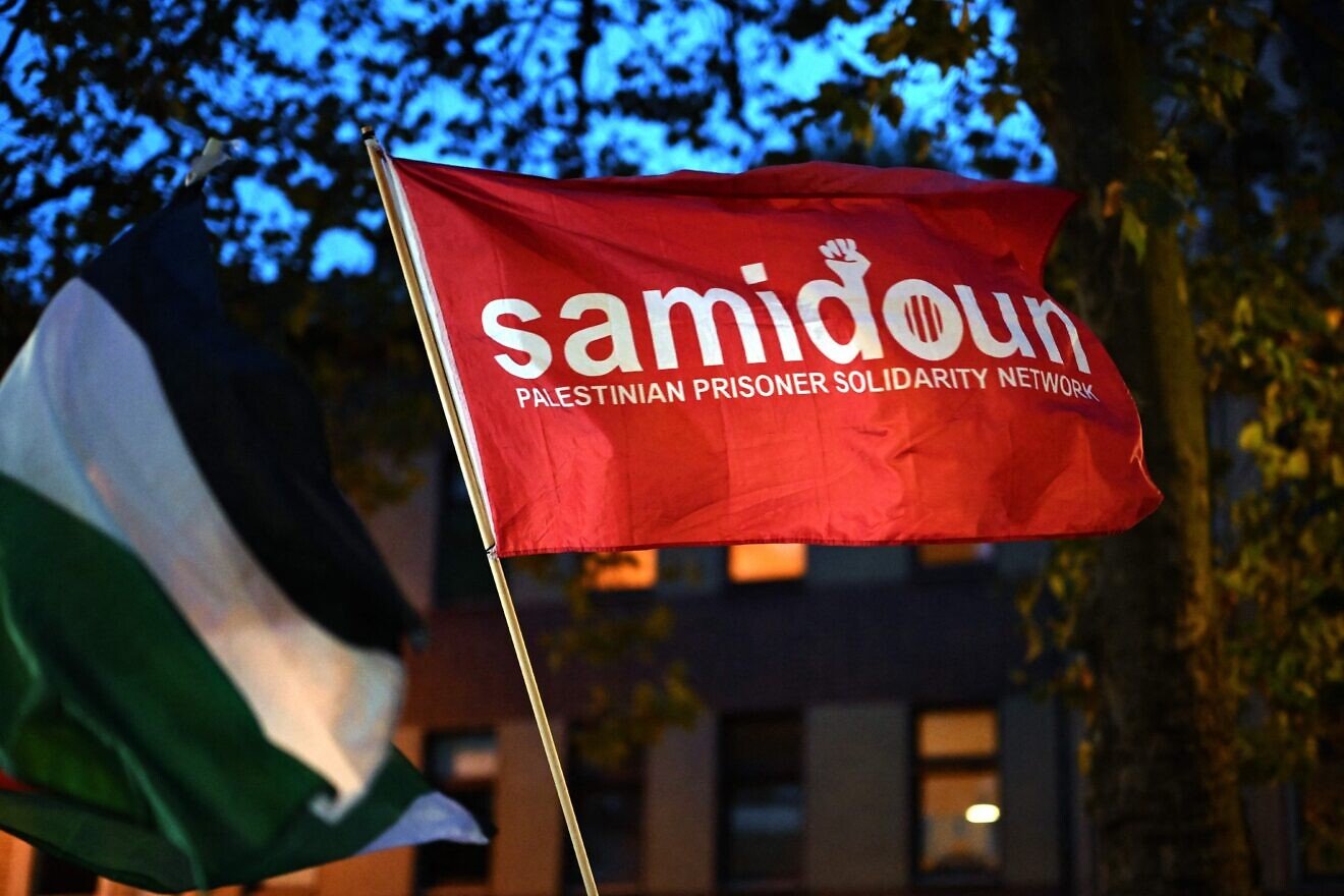 A flag for the terror group Samidoun at an anti-Israel rally in Duisburg, western Germany, on Oct. 9, 2023. Photo by Ina Fassbender/AFP via Getty Images.