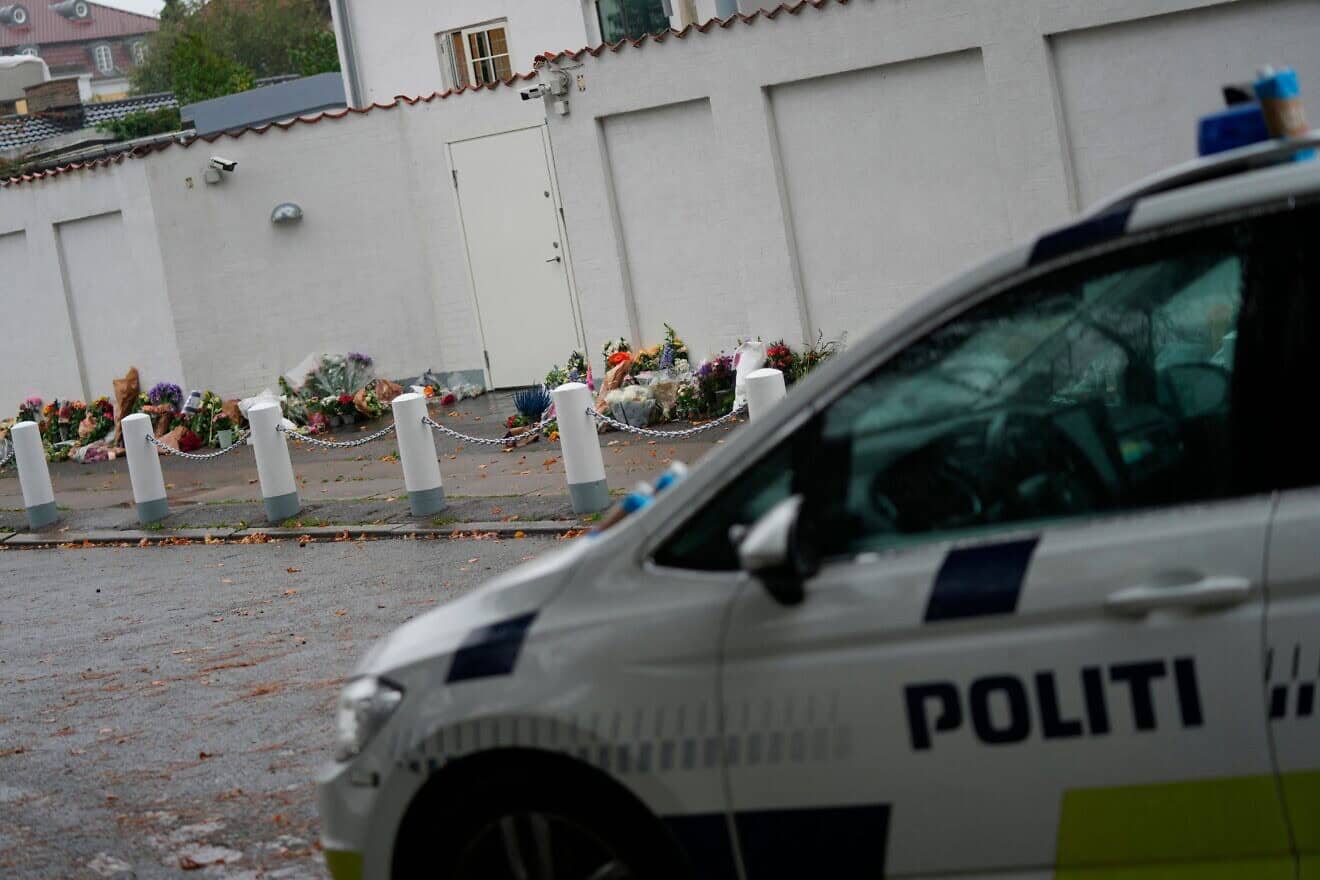 Flowers are placed at the Israeli embassy in Hellerup, north of Copenhagen, in solidarity and support with the country on Oct. 13, 2023. Photo by Ida Marie Odgaard/Ritzau Scanpix/AFP via Getty Images.