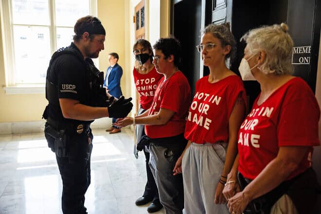 Demonstrators from Jewish Voice for Peace are taken into custody as they protest Israel's war with Hamas in the Gaza Strip at the Canon House Building in Washington, D.C., on July 23, 2024. Photo by Tierney L. Cross/Getty Images.