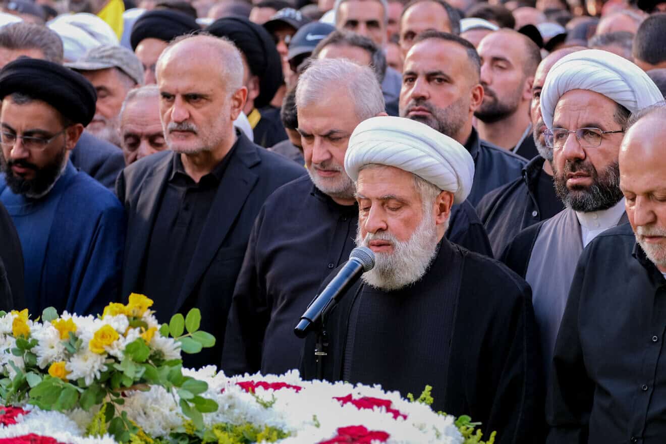 Naim Qassem, Hezbollah's second in command, addresses the crowd at the funeral of Ibrahim Aqil, the Hezbollah Radwan Forces commander, and Mahmoud Hamad, another Hezbollah commander, both killed in an Israeli airstrike on a residential building in the southern suburb of Dahiyeh in Beirut, Lebanon. Photo by Courtney Bonneau/Middle East Images/AFP via Getty Images.