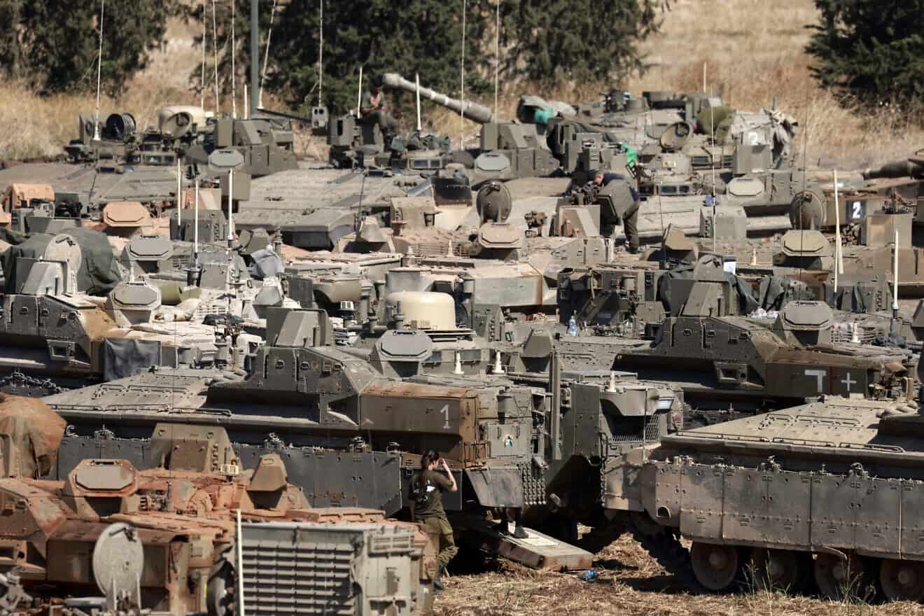 Israeli tanks and armoured vehicles are deployed in the Upper Galilee region of northern Israel near the border with Lebanon on Sept. 29, 2024. Photo by Menahem Kahana/AFP via Getty Images.