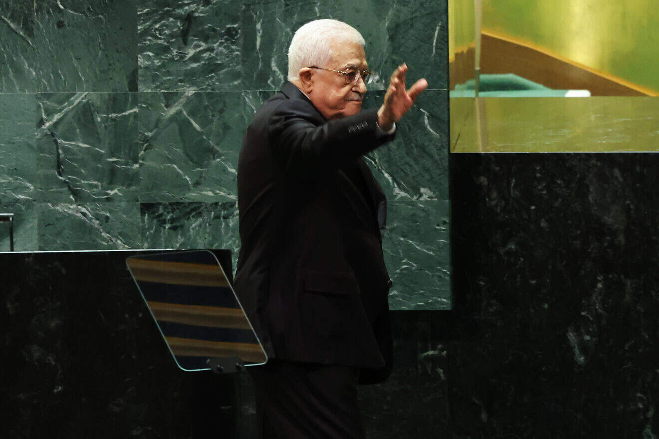 Palestinian Authority leader Mahmoud Abbas waves as he leaves the stage during the U.N. General Assembly annual general debate in New York, Sept. 26, 2024. Photo by Michael M. Santiago/Getty Images.