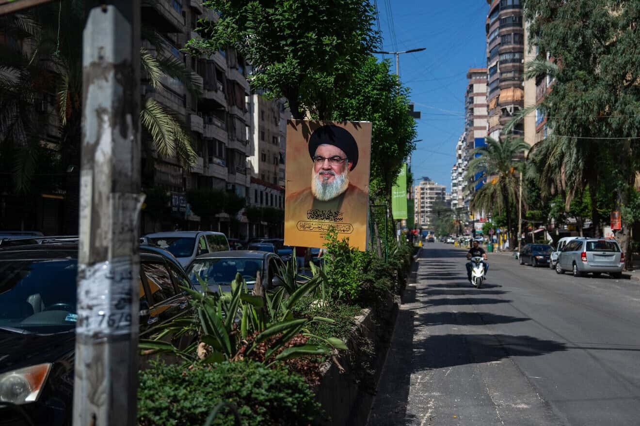 A picture of slain Hezbollah leader Hassan Nasrallah is displayed in a street in the Hezbollah stronghold of Dahiyeh, Oct. 2, 2024. Photo by Carl Court/Getty Images.
