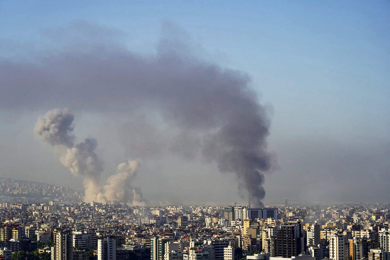 Smoke rises from the site of an Israeli airstrike that targeted Beirut's southern suburbs on Oct. 5, 2024. Photo by Etienne Torbey/AFP via Getty Images.
