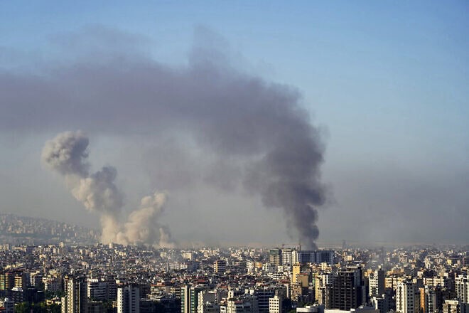 Smoke rises from the site of an Israeli airstrike that targeted Beirut's southern suburbs on Oct. 5, 2024. Photo by Etienne Torbey/AFP via Getty Images.