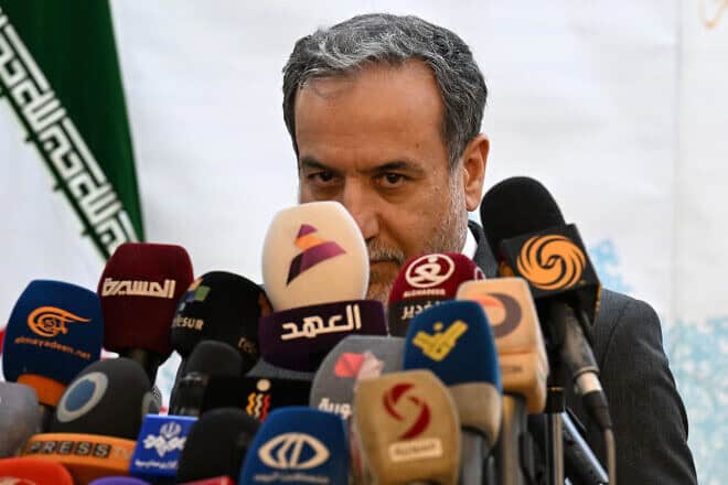 Iranian Foreign Minister Abbas Araghchi speaks to the press after meeting with Syrian officials at Tehran's embassy in Damascus, Oct. 5, 2024. Photo by Louai Beshara/AFP via Getty Images.