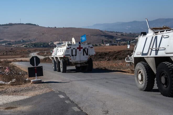 U.N. Interim Force in Lebanon (UNIFIL) armored personnel carriers depart a base in Marjayoun to patrol near the Israeli border on Oct. 5, 2024, Photo by Carl Court/Getty Images.