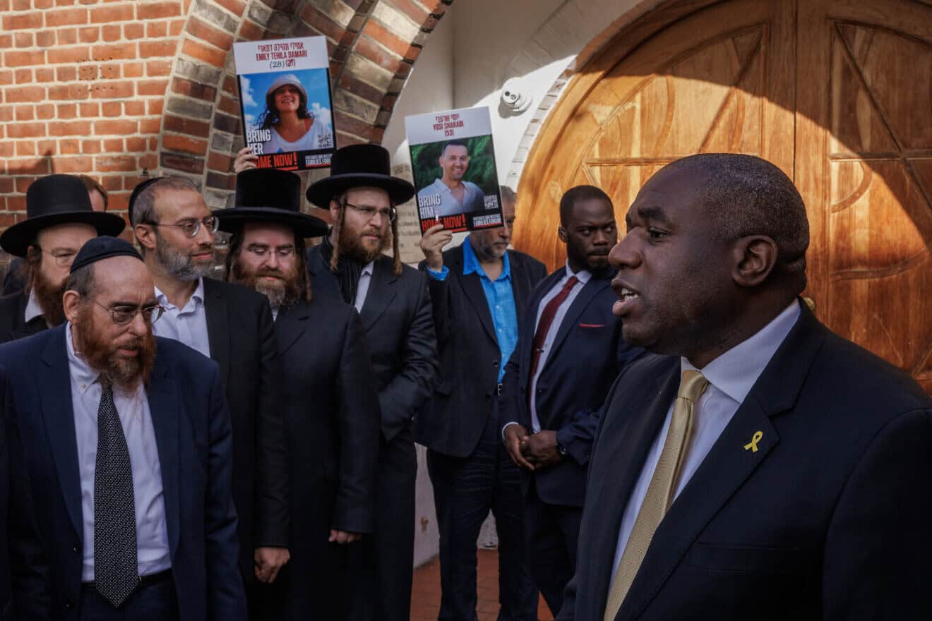 U.K. Foreign Secretary David Lammy (R) is interviewed by media at South Tottenham United Synagogue on Oct. 7, 2024 in London, England. Photo by Dan Kitwood/Getty Images.
