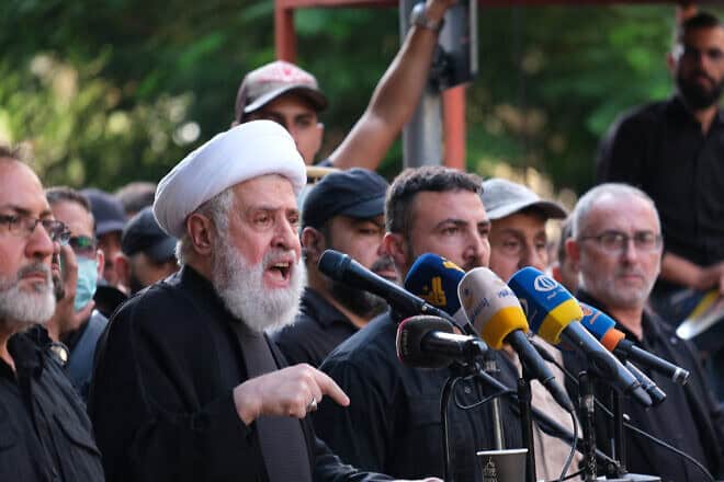 Hezbollah Deputy Secretary General Naim Qassem delivers a speech during the funeral of Hezbollah terrorist Ibrahim Aqil in Beirut, Sept. 22, 2024. Photo by Courtney Bonneau/Middle East Images/AFP via Getty Images.